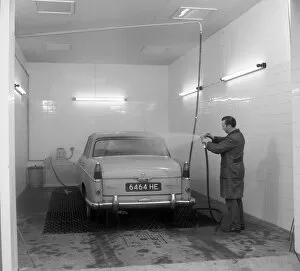 Washing Collection: A 1961 Austin Westminster in a car wash, Grimsby, 1965. Artist: Michael Walters