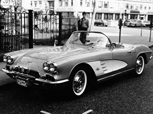 Parking Prints: 1961 Chevrolet Corvette on a parking meter, (c1961?)