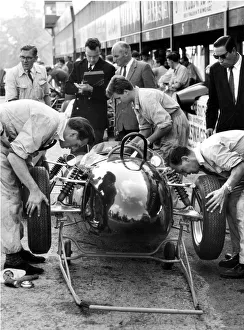Pits Prints: 1961 Ferguson P99, Stirling Moss in pits. Creator: Unknown
