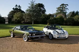 Alongside Collection: 1968 Ford Mustang with 2006 Mini Cooper convertible. Creator: Unknown