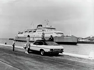 Ford Capri Prints: A 1974 Ford Capri on a quay, in front of a Townsend Thoresen car ferry, 1970s