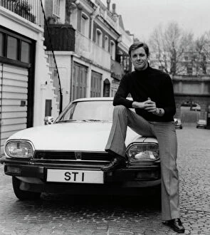 Seventies Collection: 1977 Jaguar XJS with Ian Ogilvy as The Saint tv character. Creator: Unknown