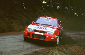 Corner Prints: 1999 Mitsubishi Lancer EVO, Network Q Rally.Timo Makinen
