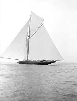 The 221 ton gaff-rigged cutter Britannia sailing under spinnaker, 1913. Creator