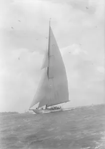 The 23-metre cutter Astra sailing close-hauled, 1933. Creator: Kirk & Sons of Cowes