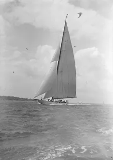 The 23-metre cutter Astra sailing close-hauled, 1933. Creator: Kirk & Sons of Cowes