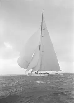 Adam Mortimer Singer Gallery: The 23-metre cutter Astra sailing with spinnaker, 1932. Creator: Kirk & Sons of Cowes