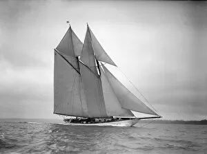 The 250 ton schooner Germania sails close-hauled, 1911. Creator: Kirk & Sons of Cowes