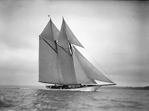 The 250 ton schooner Germania sails close-hauled, 1911. Creator: Kirk & Sons of Cowes The 250 ton schooner Germania sails close-hauled, 1911. Creator: Kirk & Sons of Cowes