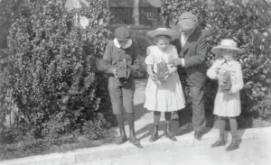 Cameras Prints: 3 children sighting box cameras, c1905. Creator: Frances Benjamin Johnston