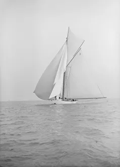 Watson Prints: The 40-rater cutter Carina sailing with spinnaker, 1913. Creator: Kirk & Sons of Cowes