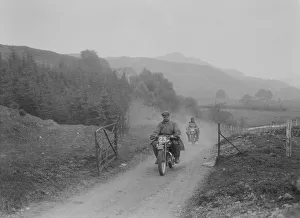 493 cc Triumphs of L Crisp and KP Jones competing in E&DMC Scottish 6 Days Trial, 1933