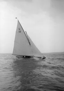 The 6 Metre Ejnar breaking waves, 1912. Creator: Kirk & Sons of Cowes The 6 Metre Ejnar breaking waves, 1912. Creator: Kirk & Sons of Cowes