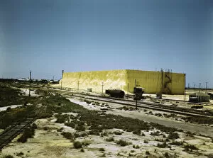 60 foot high sulphur vat, Freeport Sulphur Co. Hoskins Mound, Texas, 1943. Creator: John Vachon