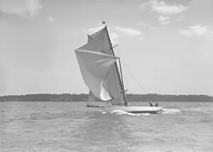 The 8 Metre class Norman running in a good breeze, 1911. Creator: Kirk & Sons of Cowes