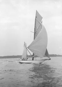 William Fife Prints: The 8-metre Ierne sailing with spinnaker, 1913. Creator: Kirk & Sons of Cowes