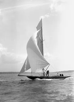 Spinnaker Prints: The 8 Metre Termagant sailing with spinnaker, 1911. Creator: Kirk & Sons of Cowes