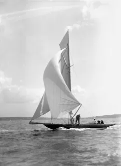 8 Metre Collection: The 8 Metre Termagant sailing with spinnaker, 1911. Creator: Kirk & Sons of Cowes
