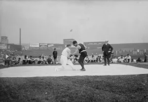 Boxer Prints: Abe Attell & Young Corbett, 1918. Creator: Bain News Service