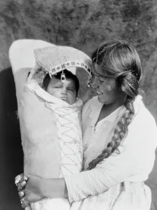 Achomawi mother and child, c1923. Creator: Edward Sheriff Curtis