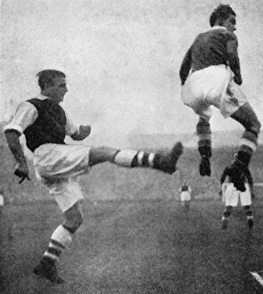 Eddie Gallery: Action from an Arsenal v Chelsea football match, c1936-c1944. Artist: Sport & General