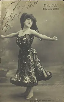 Cross Dressing Prints: An actor in drag, known as 'Maurice'; poses on stage mid-dance