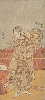 The Actor Sawamura Sojuro III Holding up a Piece of Brocade, late 18th century. Creator: Shunsho