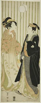 The actor Segawa Kikunojo and a young woman kicking a ball, n. d