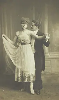 Petticoat Prints: Two actors, one in drag, dancing together on stage, 1918. Creator: Unknown