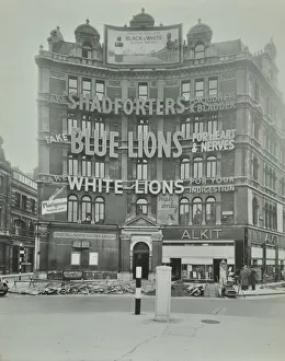 Greater London Council Gallery: Advertisements at Cambridge Circus, Westminster, London, 1945