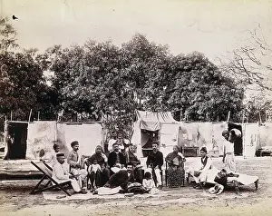 Mumbai Maharashtra India Prints: An affluent family forced to leave their home due to plague in their neighbourhood sitting