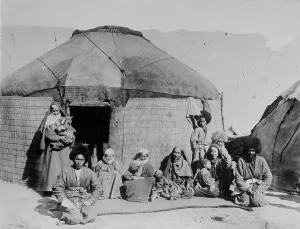 Nomadic Prints: Afghan nomads, seated outside tent, 1919. Creator: Bain News Service
