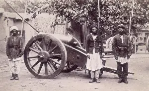1878 79 Prints: Three Afghan soldiers standing next to a cannon, Afghanistan, 1880s. Creator: Unknown