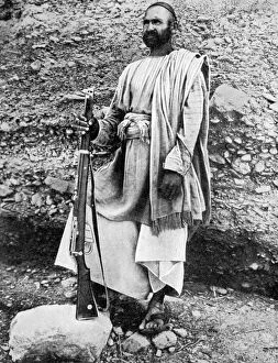 Peoples Of The World In Pictures Gallery: Afghan tribesman, 1936.Artist: Fox