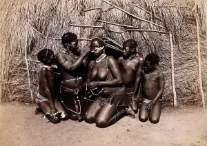 Tribal Culture Prints: Africa: African women adorning themselves with beads