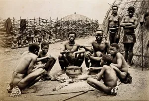 Crouching Prints: Africa: men of the Hlubi tribe eating, between 1800 and 1899. Creator: Unknown