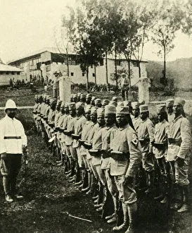 German East Africa Prints: African soldiers fighting for Germany, First World War, 1914, (c1920). Creator: Unknown