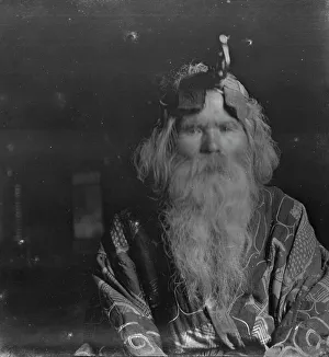 Aino Prints: Ainu chief wearing a headdress, 1908. Creator: Arnold Genthe