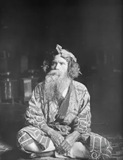 Aino Prints: Ainu chief wearing a headdress, 1908. Creator: Arnold Genthe