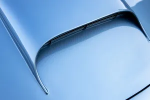Grand Tourer Prints: Air intake of a 1961 Aston Martin DB4 GT SWB lightweight. Creator: Unknown
