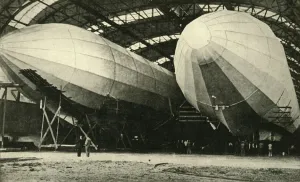 Zeppelin Prints: Airships in hangar, First World War, 1914, (c1920). Creator: Unknown