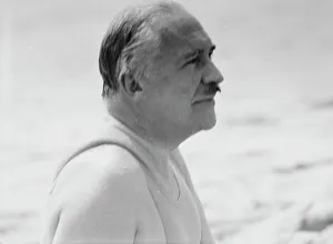 Herter Albert Prints: Albert Herter at the beach, between 1932 and 1942. Creator: Arnold Genthe
