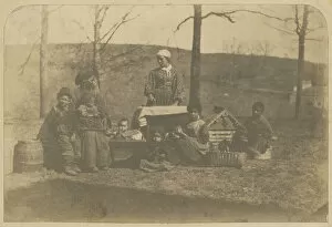 Albumen print of enslaved women and their children near Alexandria