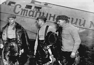 Airfield Prints: Alexander Belyakov, Georgiy Baidukov and Valery Chkalov by their plane on June 20