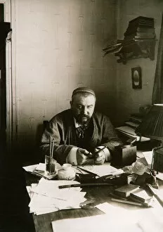 Bulla Gallery: Alexander Kuprin, Russian author, at his desk, Gatchina, Russia, early 20th century