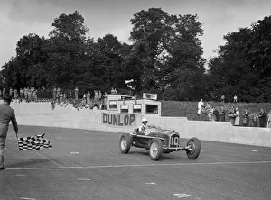Finishing Prints: Alfa Romeo of Kenneth Evans taking the chequered flag at Crystal Palace