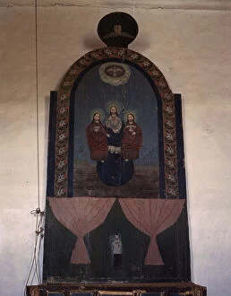 Walls Gallery: An altar in the church dedicated to the Trinity, Trampas, N.M. 1943. Creator: John Collier