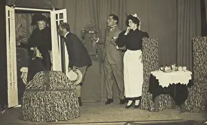Cross Dressing Prints: Amateur actors, one in drag, perform a scene on stage