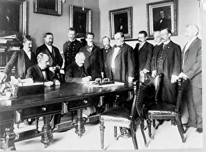 Agreement Prints: Ambassador Cambon signing the Peace Protocol, c1898. Creator: Frances Benjamin Johnston