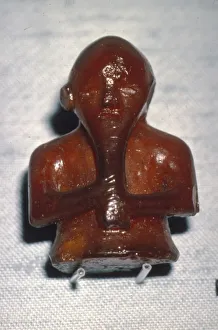 Amber Prints: Amber Playing-Piece. Man with Long beard, from Roholte, Denmark, c8th-mid 11th century